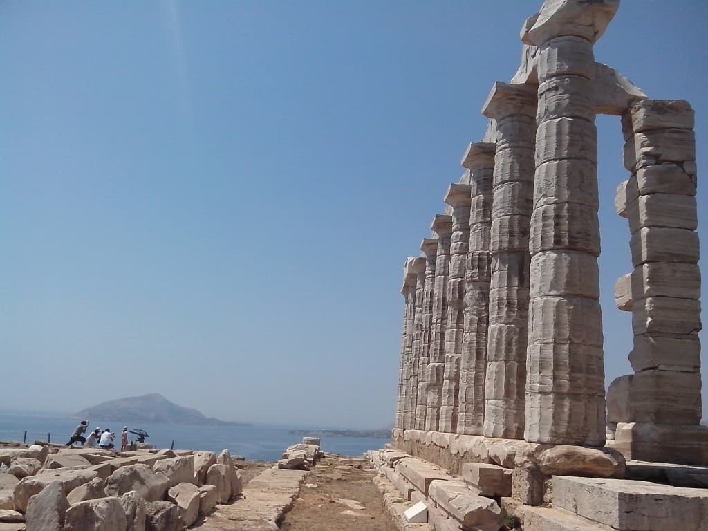ruins of the classical Greek Temple at cape sounion with a view to the sea