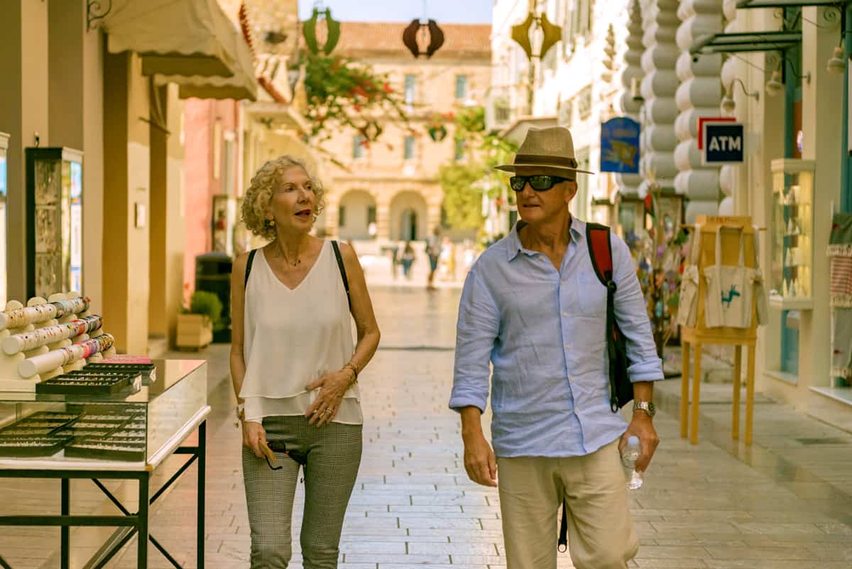 two tourists walk along the pretty streets of Nafplion