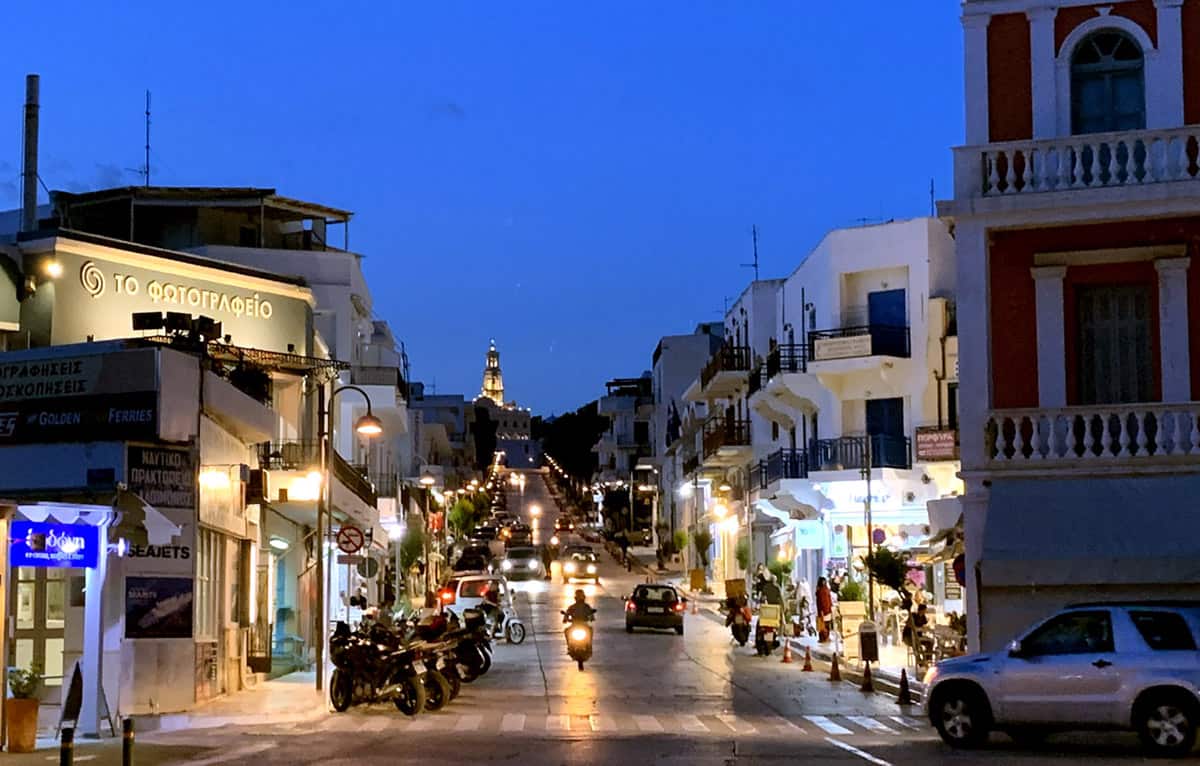 the main town of tinos in the evening